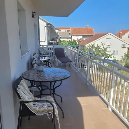 Optimum Трогір